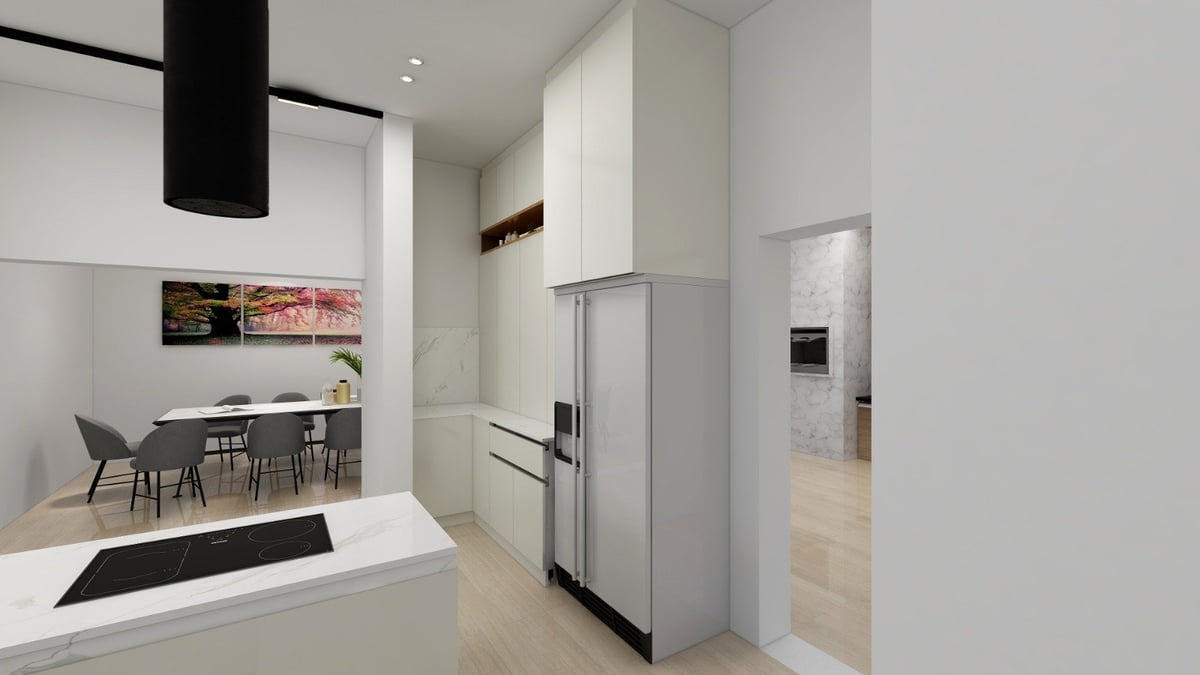 Modern kitchen with white cabinetry, stainless steel refrigerator, black pendant light, and dining area in open floor plan