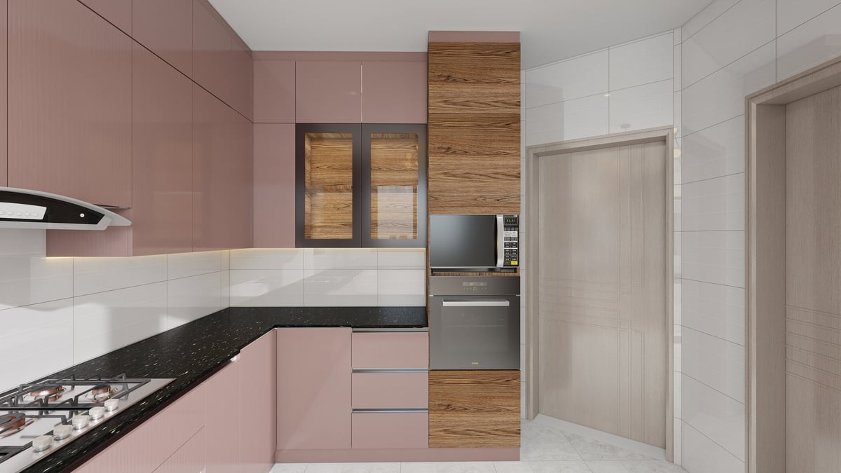 Modern kitchen interior with pink and wood cabinets, black granite countertop, stainless steel appliances, and white tile backsplash