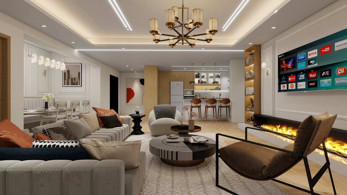 Modern open-concept living room with cream furniture, fireplace, brass lighting fixture, and contemporary decor