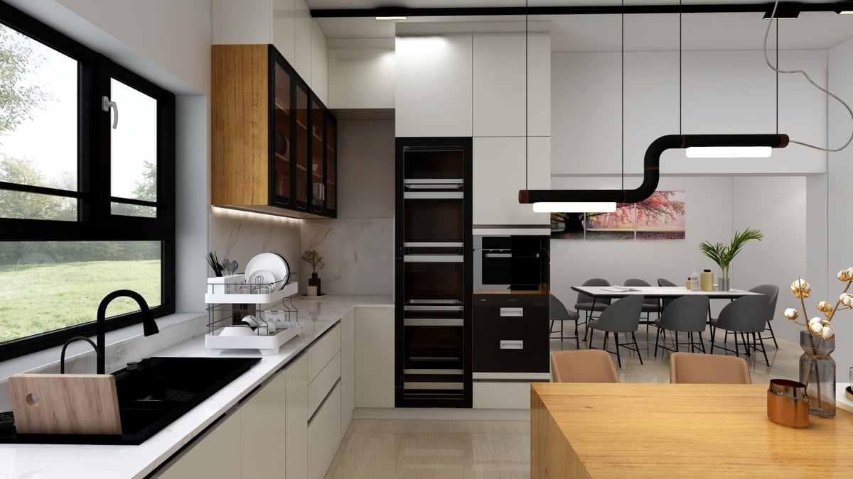 Modern kitchen with white cabinetry, black sink, wooden dining table, and open floor plan to dining area with pendant lights