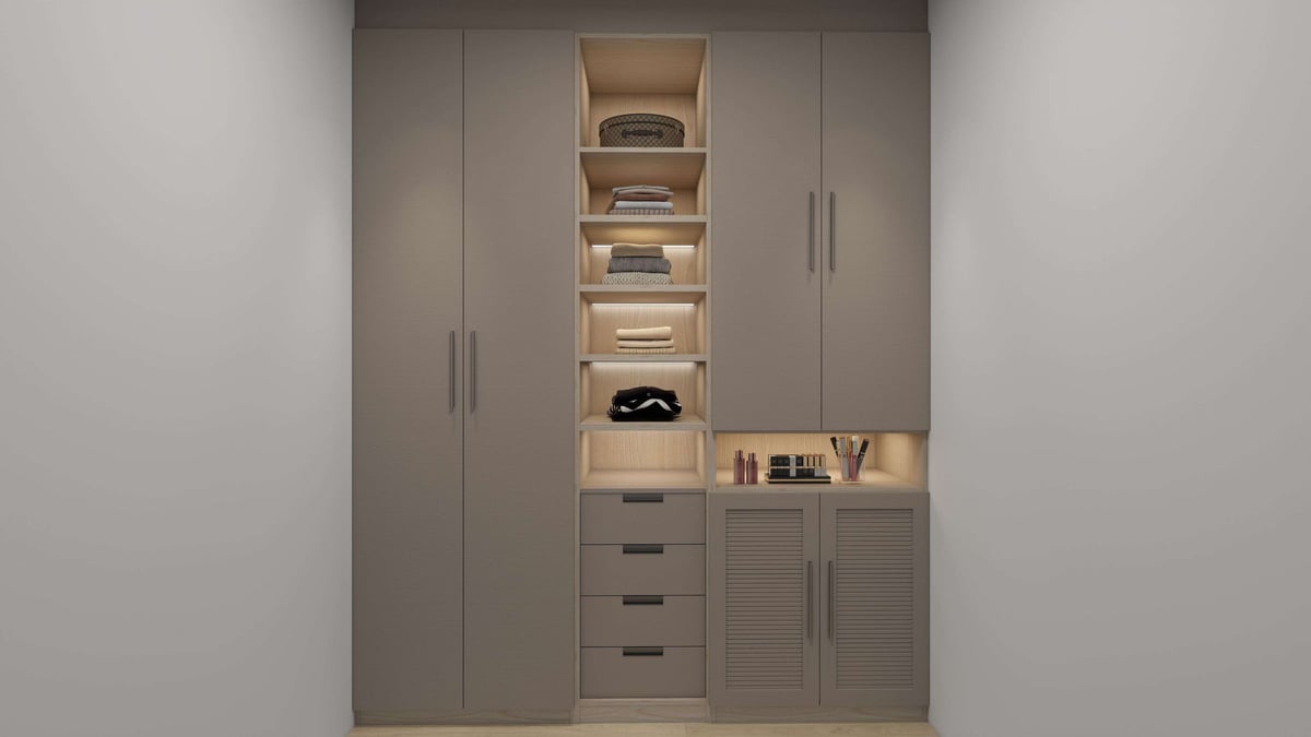 Modern built-in wardrobe with gray doors, open shelving displaying folded clothing, and integrated drawers