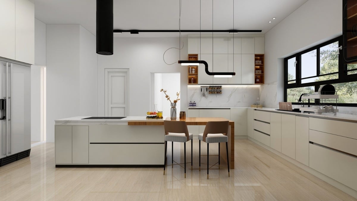 Modern minimalist kitchen with cream cabinetry, wooden dining table, black pendant lights, and white countertops