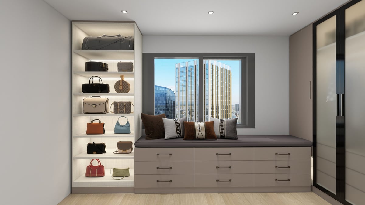 Modern walk-in closet with display shelving for handbags, window seat with city view, and multi-drawer dresser.