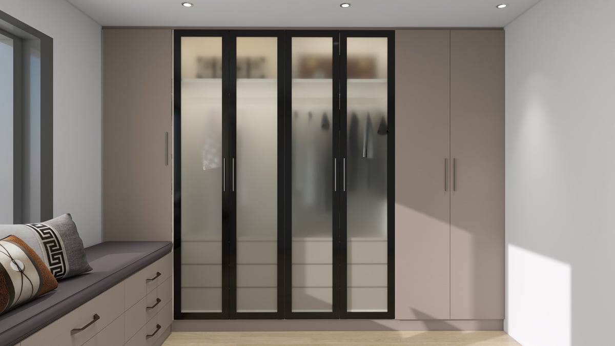 Modern bedroom with frosted glass sliding wardrobe doors and beige built-in storage
