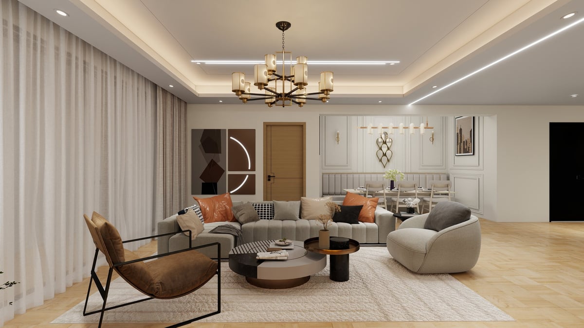 Modern living room with neutral tones, curved seating, round coffee table, and decorative pendant lighting