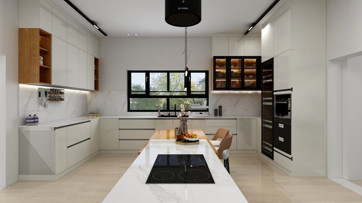 Modern kitchen with white cabinets, central island with black cooktop, wooden shelving, and large windows overlooking greenery