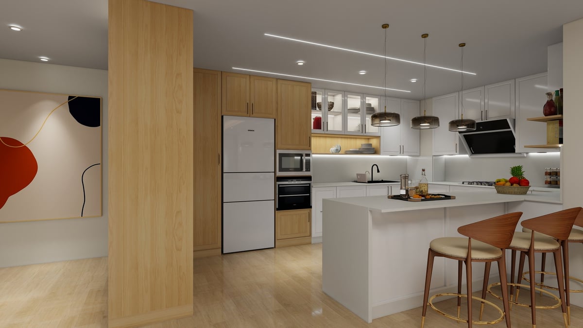 Modern kitchen and dining area with white cabinetry, wood accents, central island, and wooden bar seating.