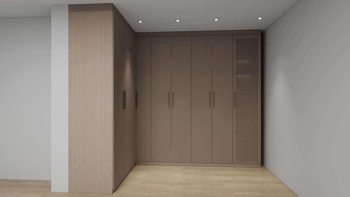 Modern bedroom with built-in wooden wardrobe doors, light wood flooring, white walls, and recessed ceiling lights